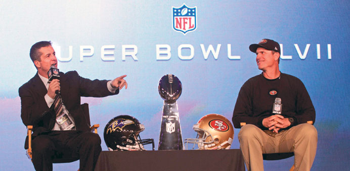 Harbaugh brothers take 49ers, Ravens to Super Bowl