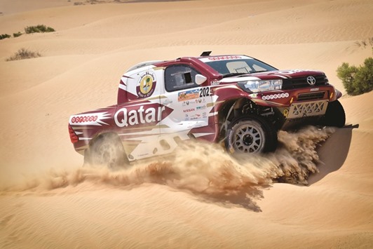 Qataru2019s Nasser Saleh al-Attiyah in action in Abu Dhabi yesterday.