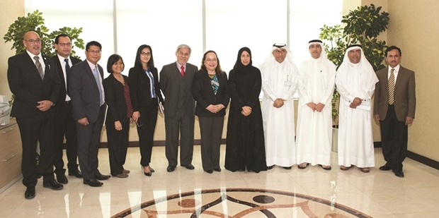 HE the Minister of Public Health Dr Hanan Mohamed al-Kuwari and Dr Rossel-Ubial, with MMG chief executive Dr Tiongco and other dignitaries after their meeting in Doha.