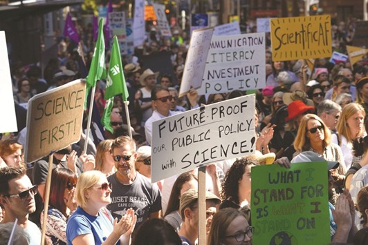 Supporters of science and research gather to take part in the March for Science demonstration in Sydney yesterday.