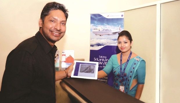 The first digital card of SriLankan Airlines frequent flyer programme, FlySmiLes, was presented to cricketing legend Kumar Sangakkara.