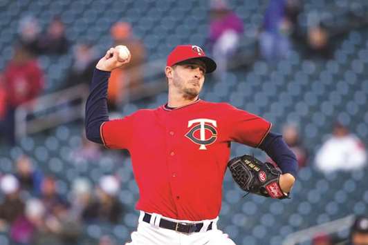 Keuchel works five solid innings in Twins' debut