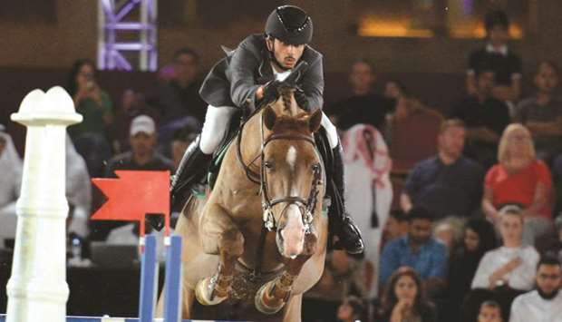 Salmeen Sultan al-Suwaidi rides Guilderu2019s Empire of the Sun to victory in the Big Tour Class during the 11th leg of the Hathab Equestrian Series at Souq Waqif yesterday. PICTURES: Lotfi Garsi