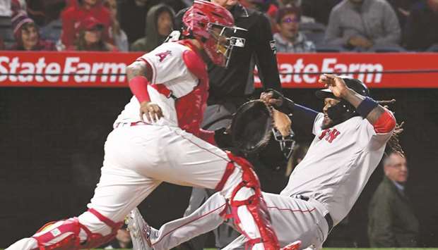 Hanley Ramirez helps Red Sox beat Marlins 4-2 in 13 innings