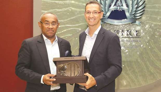 Confederation of African Football president Ahmad Ahmad (left) with Aspire Academy director general Ivan Bravo.