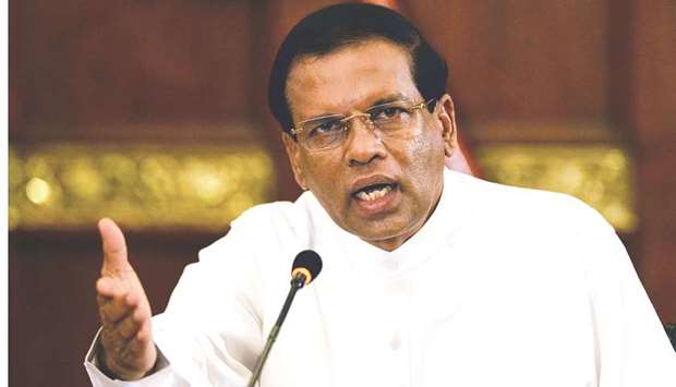 Sri Lankan President Maithripala Sirisena addresses a press conference in Colombo.