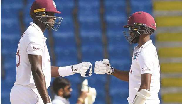 Jason Holder (left) and Kraigg Brathwaite of West Indies had an 87-run partnership in the second innings of the second Test against Sri Lanka. (AFP)