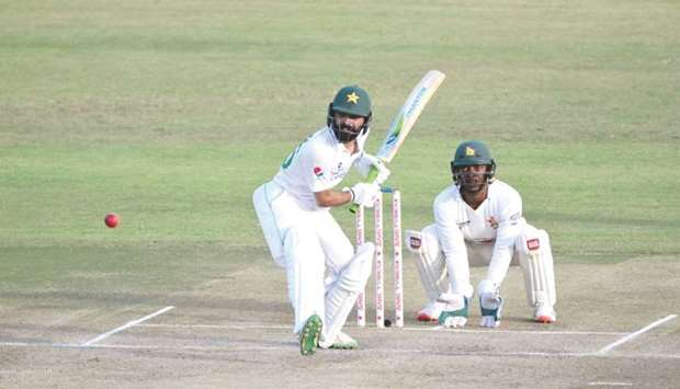 Pakistanu2019s Fawad Alam (left) in action during the second day of the first Test against Zimbabwe in Harare, Zimbabwe, yesterday. (Twitter/PCB)