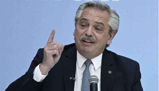 In this file photo taken on March 23, Argentina's President Alberto Fernandez delivers a speech during the ceremony to honor Abuelas and Madres de Plaza de Mayo members with the Juana Azurduy award, at the Casa Rosada in Buenos Aires, on the eve of the 45th anniversary of the military coup