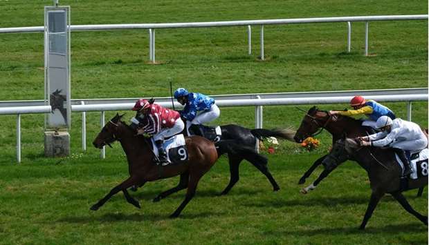 Olivier Peslier (left) rides Karaamah to victory in the Qatar Prix Massoud in Bordeaux, France, on Friday. (Polin & Ferriere)