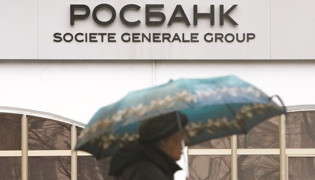 The logo of Rosbank is seen at a bank branch in Moscow on Monday. Rosbank will rejoin the business empire of Potanin, the 61-year-old head of mining giant Norilsk Nickel, who has been sanctioned by Canada under western moves against Russiau2019s business and political elite over its invasion of Ukraine.