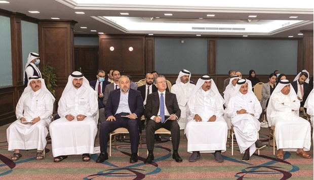 Qatar Chamber chairman Sheikh Khalifa bin Jassim al-Thani and first vice chairman Mohamed bin Towar al-Kuwari joins other Qatari businessmen and representatives of local companies during the seminar.