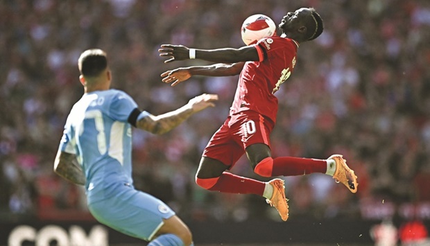 Liverpoolu2019s Sadio Mane (right) controls the ball during the FA Cup semi-final against Manchester City at the Wembley Stadium in London yesterday. (Reuters)