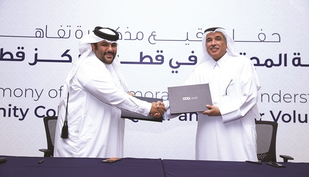 Dr Mohamed Ibrahim al-Naemi and Moeed al-Qahtani at the MoU signing ceremony.