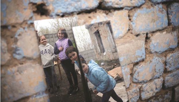 Children are seen reflected in the mirror at a shelter for refugee mothers and children who fled #Russiau2019s invasion of Ukraine, in the town of Novomoskovsk, in Ukraineu2019s Dnipro region.