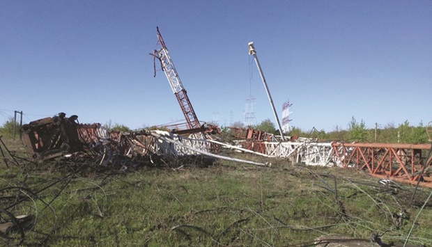 This handout picture released yesterday by the Transnistrian Interior Ministry shows antennas of the u201cMayaku201d radio centre lying on the ground following the blasts in the village of Mayak in Grigoriopolsky district in Moldovau2019s Russian-backed breakaway Transnistria region. (AFP)