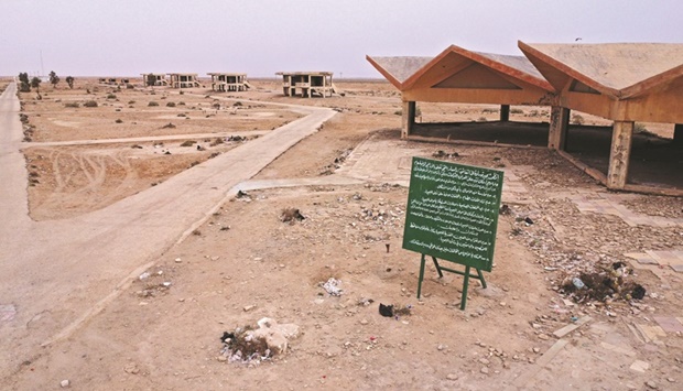 Abandoned hotels and tourist facilities are seen at dried-up Sawa Lake, in Iraqu2019s southern province of Muthana.