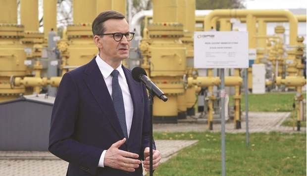 Polish Prime Minister Mateusz Morawiecki gives a press statement on the gas halt from Russia at the gas transmission point in Rembelszczyzna near Warsaw yesterday. (AFP)