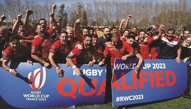 Spain players and staff celebrate after qualifying for the 2023 Rugby World Cup on March 13, 2022.