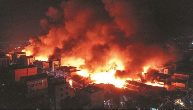 This picture taken near the village of Gouves, on Euboea island, second largest Greek island, on August 8, 2021 shows a raging fire. Hundreds of firefighters battled a blaze on the outskirts of Athens as several fires raged in Greece. (AFP)