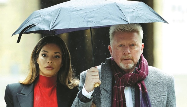 Former tennis player Boris Becker (right) arrives at Southwark Crown Court in London yesterday to attend his trial over charges relating to his bankruptcy. (AFP)