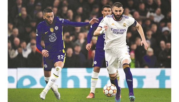 Real Madridu2019s Karim Benzema (right) vies for the ball with Chelseau2019s Hakim Ziyech during the UEFA Champions League quarter-final first leg match in London. (AFP)