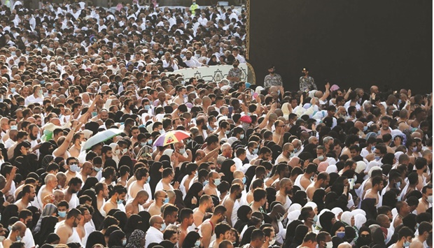 Muslims pray around the Holy Kaaba, at the Grand Mosque complex in the  city of Makkah, during the fasting month of Ramadan, yesterday.