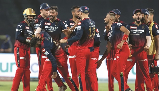 Royal Challengers Bangalore celebrate during their win over Mumbai Indians in the IPL in Pune yesterday.