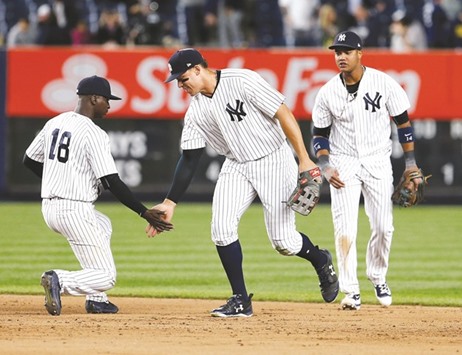 New York Yankees shortstop Didi Gregorius (18) celebrates with