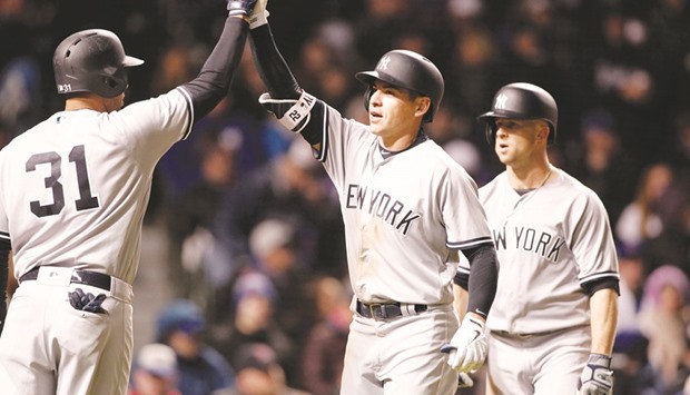 Yankees Defeat Cubs on Ninth-Inning Home Run by Brett Gardner