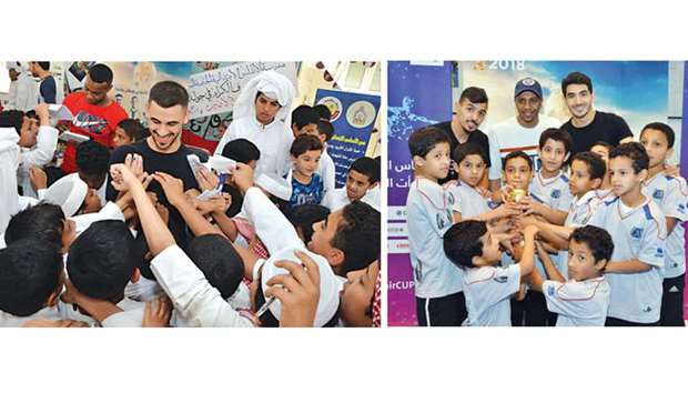 Al Gharafau2019s duo Asim Madibo and Yousif Hassan visited Al Andalus School for Boys along with the QFA delegation. Right: Al Rayyan players Abdulrahman al-Harazi, Soud Khater and Mohamed Alau2019a visited Umm Salal Mohammed Model School for Boys.