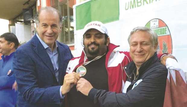 Hamad al-Marri (pictured, centre)