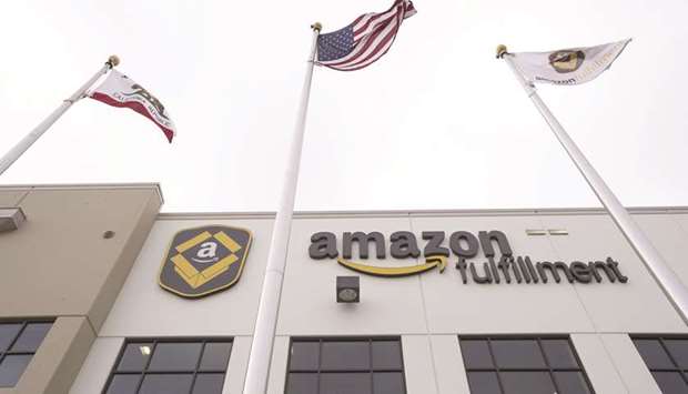 Amazon.com signage is displayed on the facade of the companyu2019s fulfilment centre in Tracy, California (file). Amazon aims to increase the appeal of its site by adding hundreds of exquisite handmade arts and crafts not available anywhere else online.