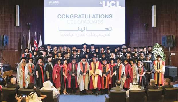 UCL Qatar graduates and faculty are seen with dignitaries at the ceremony.