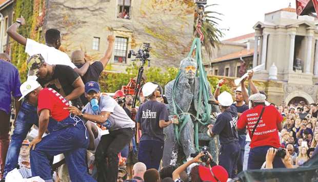 The bronze statue of British colonialist Cecil John Rhodes is removed from the Cape Town University campus, South Africa.