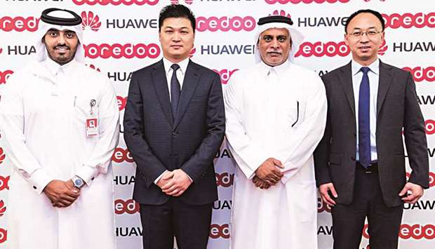 Senior Ooredoo and Huawei executives following the agreement signing between Ooredoo and Huawei yesterday.