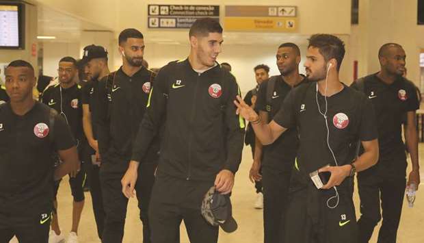 Members of the Qatar team pose after their arrival at the Rio de Janeiro airport yesterday, ahead of the  Copa America, which will take place in Brazil from June 14 to July 7.