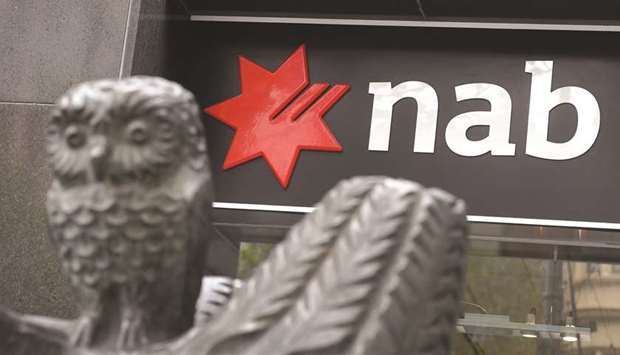 A National Australia Bank sign adorns a branch of the bank in Melbourne. NAB said that in the past six months it had put aside Aus$525mn for u201ccustomer-related remediation costsu201d, bringing the total provisions to Aus$1.1bn.