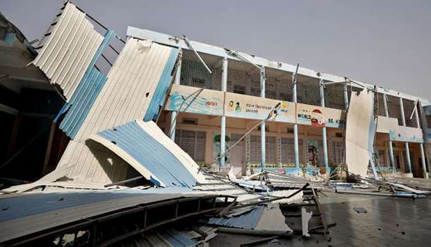 A view shows the damaged rooftop of a school building following Cyclone Tauktae in Vanakbara in Diu, India