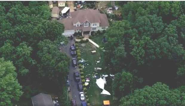 Aerial video from television channels showed evidence of the chaos that erupted after the shooting, with tents and chairs toppled, and debris strewn across the property.