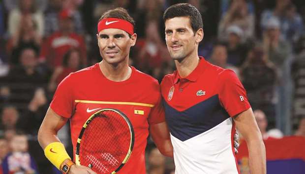 Friends and rivals: Rafael Nadal with Novak Djokovic. Reuters file photo