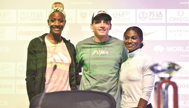 From left: Shaunae Miller-Uibo of Bahamas, Armand Duplantis of Sweden and Dina Asher-Smith of Great Britain pose after a press conference at the 3-2-1 Qatar Olympic and Sports Museum in Doha on Thursday.