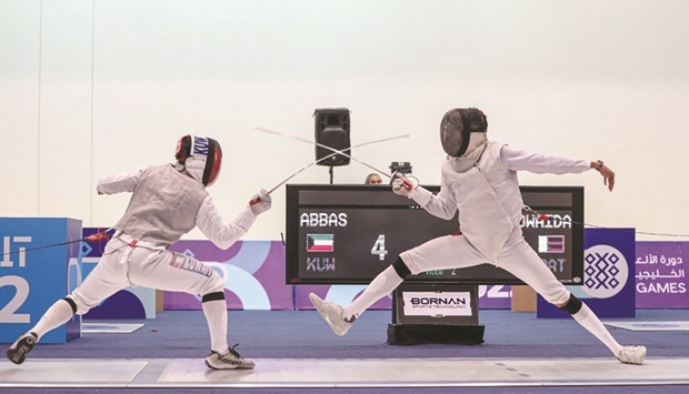 Qataru2019s Ali Owaida (right) in action against Kuwaitu2019s Ali Abbas during the fencing final at the GCC Games on Sunday.