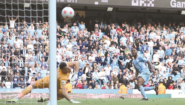 Manchester Cityu2019s Raheem Sterling scores their fifth goal against Newcastle United during their Premier League match in Manchester yesterday. (Reuters)