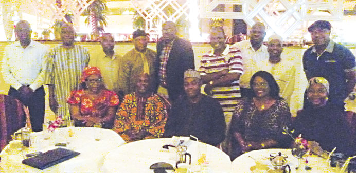 Ambassador Ahmed (seated middle) with Millar and other NIDO-Qatar executives pose for photo after the meeting held in Sheraton.