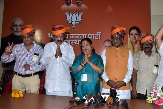 Rajasthan Chief Minister Vasundhara Raje is seen with the Bharatiya Janata Partyu2019s candidates M Venkaiah Naidu, Om Prakash Mathur, Ramkumar Verma and Harshvardhan Singh Dungarpur after they victory in the Rajya Sabha elections, in Jaipur yesterday.