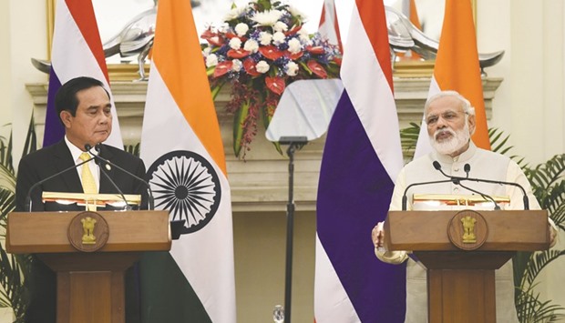 Thailandu2019s Prime Minister Prayut Chan-o-Cha (left) looks on as Indian Prime Minister Narendra Modi speaks after a meeting in New Delhi on Friday. During the meeting, the India-Thailand Joint Business Forum recommended a target of doubling bilateral trade from the current $8bn level to $16bn in the next five years.