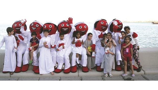 Ooredoou2019s popular mascots the Alrabaa entertain children on Doha Corniche.