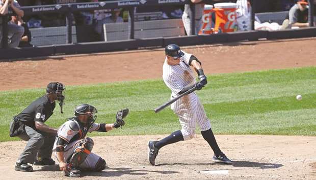 Judge homers as Yankees roll by Orioles