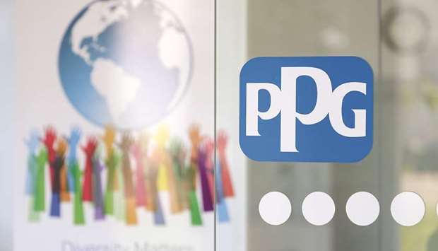 The PPG Industries logo is seen on a glass panel at PPGu2019s automotive coatingu2019s technical centre in Ingersheim, Germany. PPGu2019s swoop on Akzo has caused fury among the Dutch political establishment who turned its takeover plan into a political football to be used in the election debate.